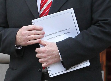 Health Minister James Reilly with the report of the Expert Group on reform of Ireland's abortion laws.