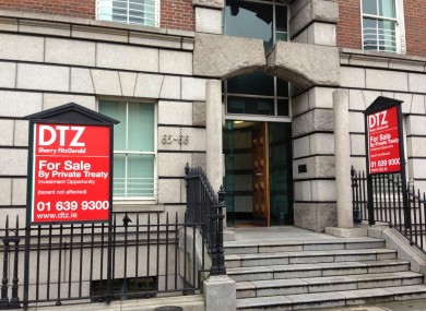 For Sale signs installed outside the building where Fianna Fáil HQ is based this morning.