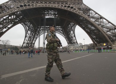A French soldiers patrols infront of the Eiffel tower yesterday as France tightened security in public places following its intervention in Mali.