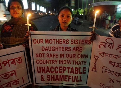 Women hold a candlelight vigil in Gauhati, India, last night.