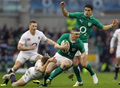 Brian O'Driscoll is tackled by Billy Twelvetrees.