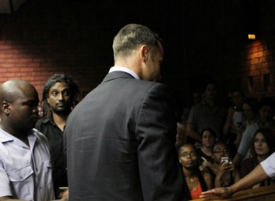 Oscar Pistorius leaves court on Friday.