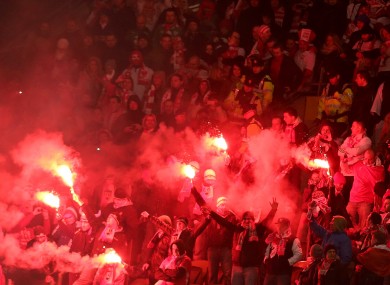 Flares at last night's game regularly had to be extinguished by members of security.
