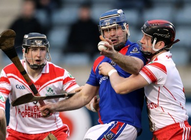 St. Thomas' Richard Murray and Joey Scullion of Loughgiel Shamrocks.