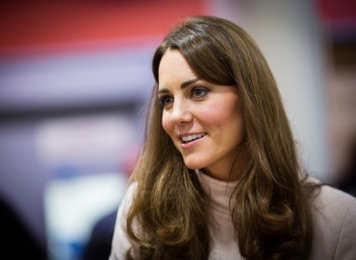 Kate Middleton, literally carrying a baby inside her